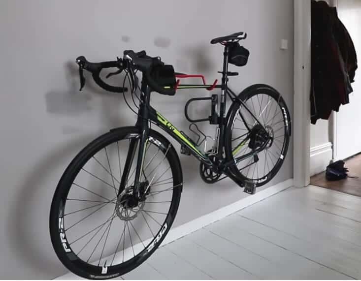 horizontal bike rack flat against wall